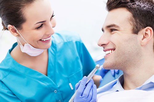 smiling man at dental office