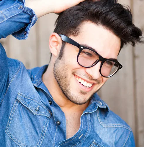 A young man smiling