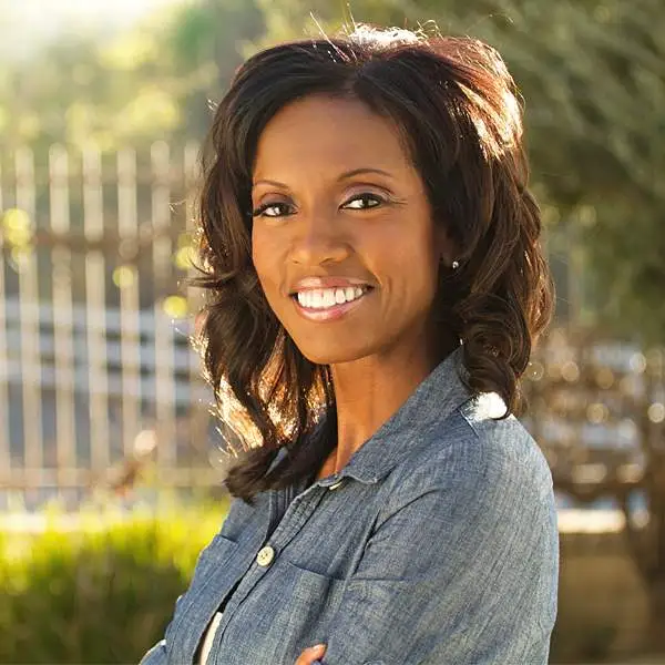 A young black woman smiling