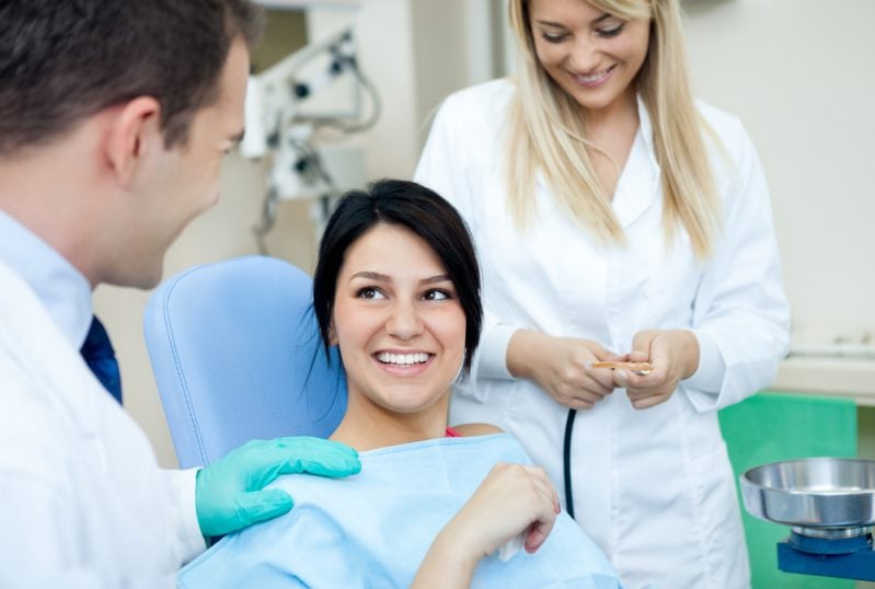 smiling woman at dental office